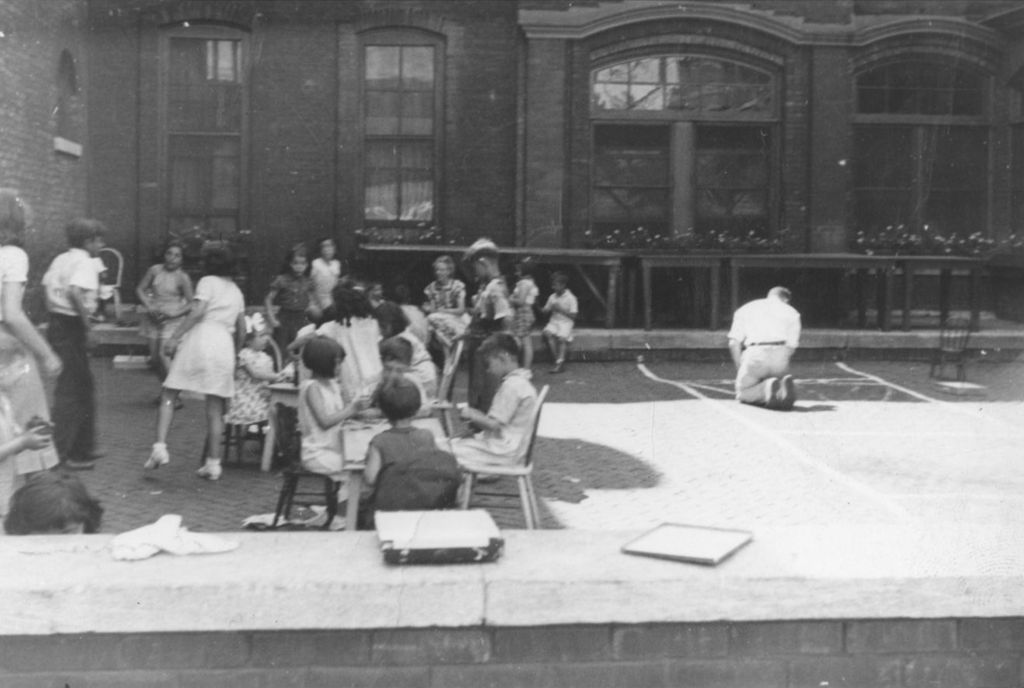 Children on the Hull-House front courtyard during summer day camp