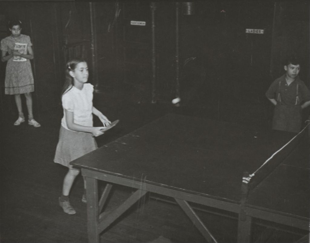 Miniature of Girl playing table tennis in Hull-House game room