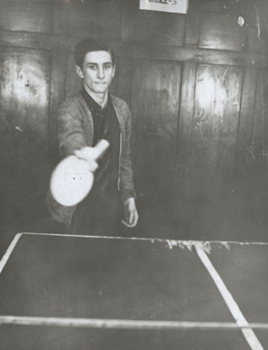 Miniature of Teen boy playing table tennis in Hull-House game room