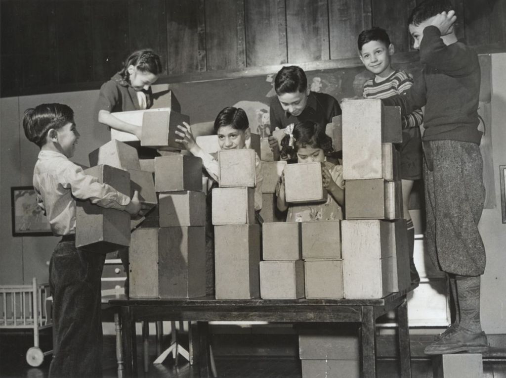Miniature of Children engaging in free play with large wooden blocks at Hull-House