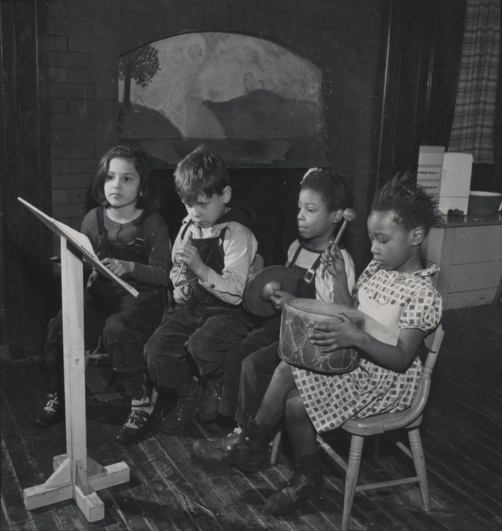 Miniature of Four children playing musical instruments at Hull-House