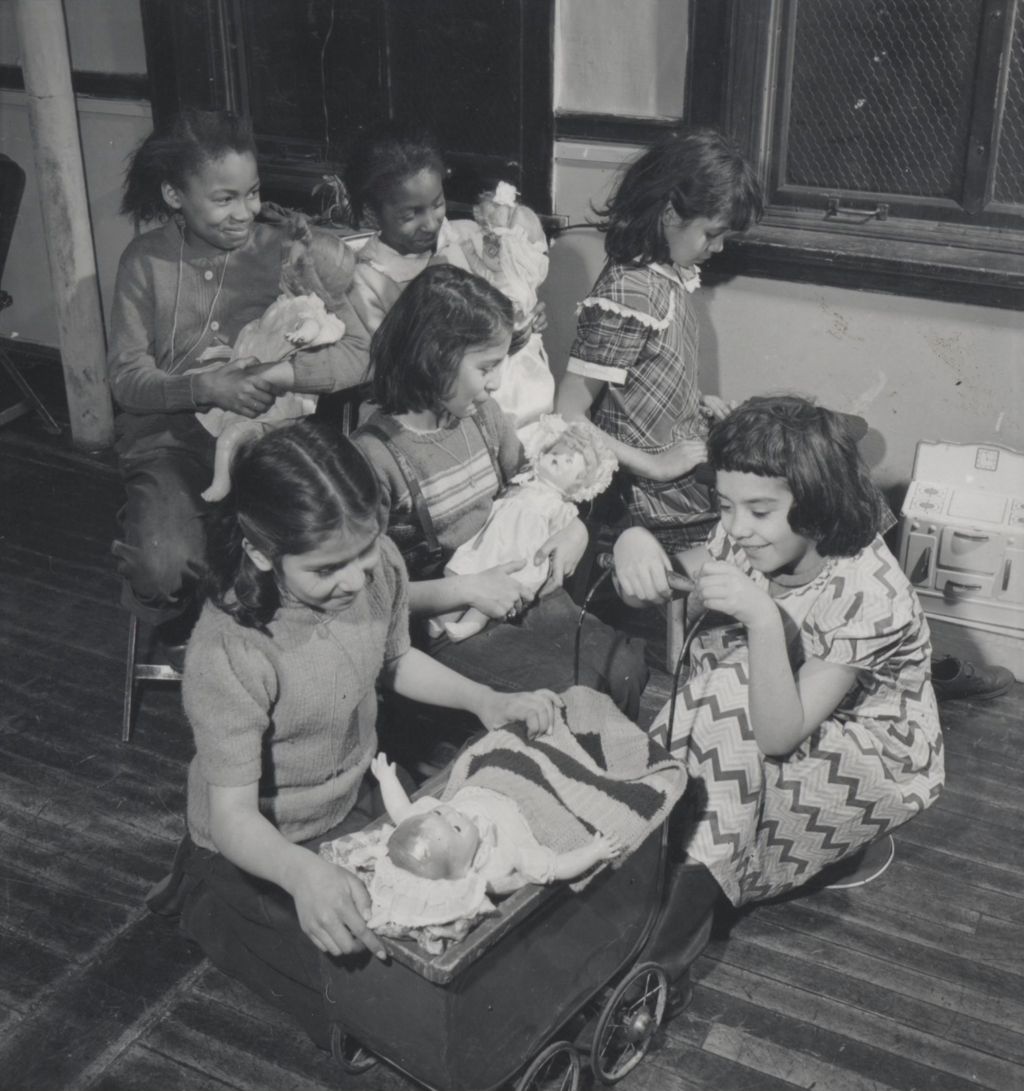 Miniature of Girls in a Hull-House play group with dolls
