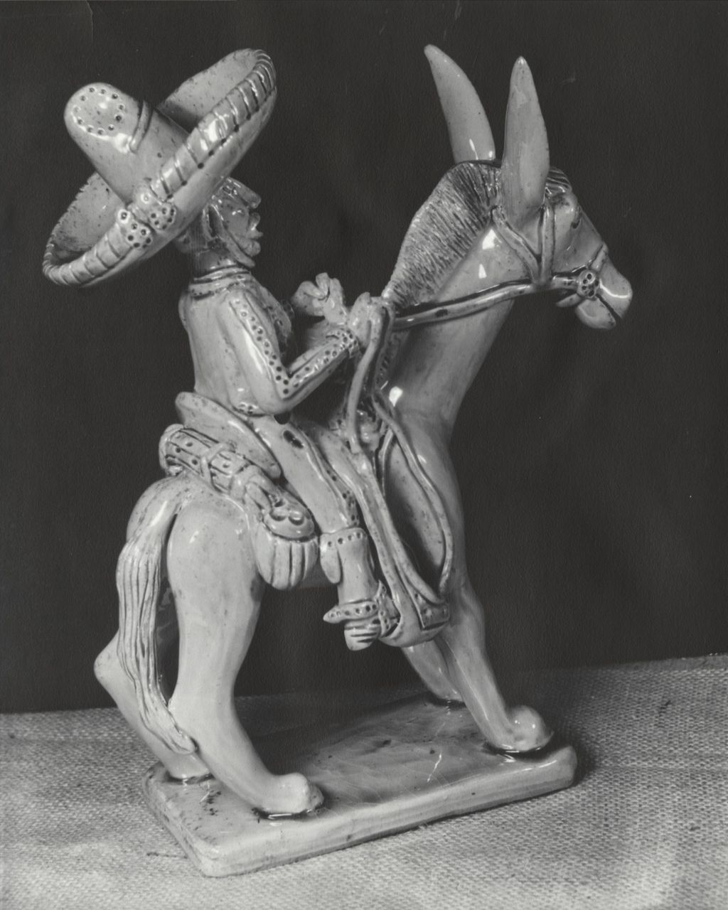 Ceramic sculpture of a Mexican cowboy on horseback