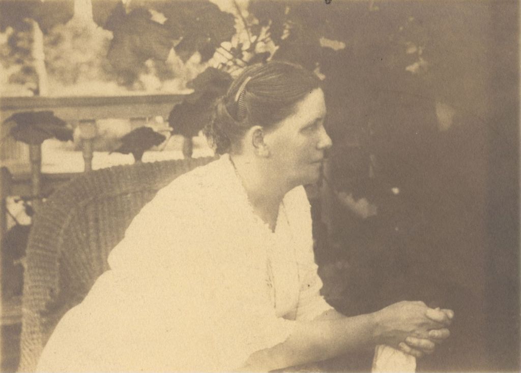 Miniature of Unidentified woman sitting in a wicker chair