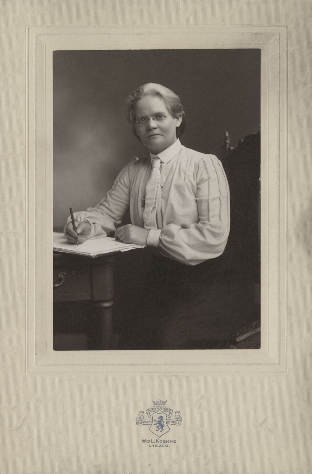 Miniature of Unidentified woman sitting at desk