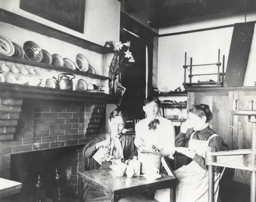 Miniature of Hull-House co-founders Ellen Gates Starr and Jane Addams having tea with Peter Verburg in the Labor Museum