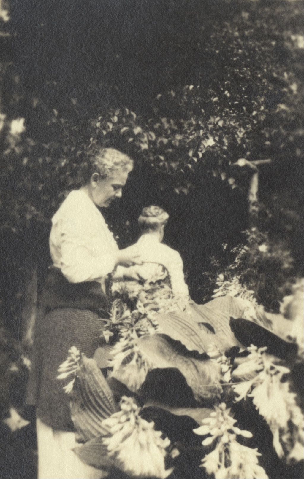 Miniature of Mary Rozet Smith and Louise De Koven Bowen gathering flowers at Bowen Country Club