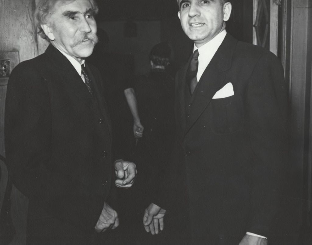 Miniature of Hull-House residents George E. Hooker and Robert (Bob) Cairo at a reception at Hull-House