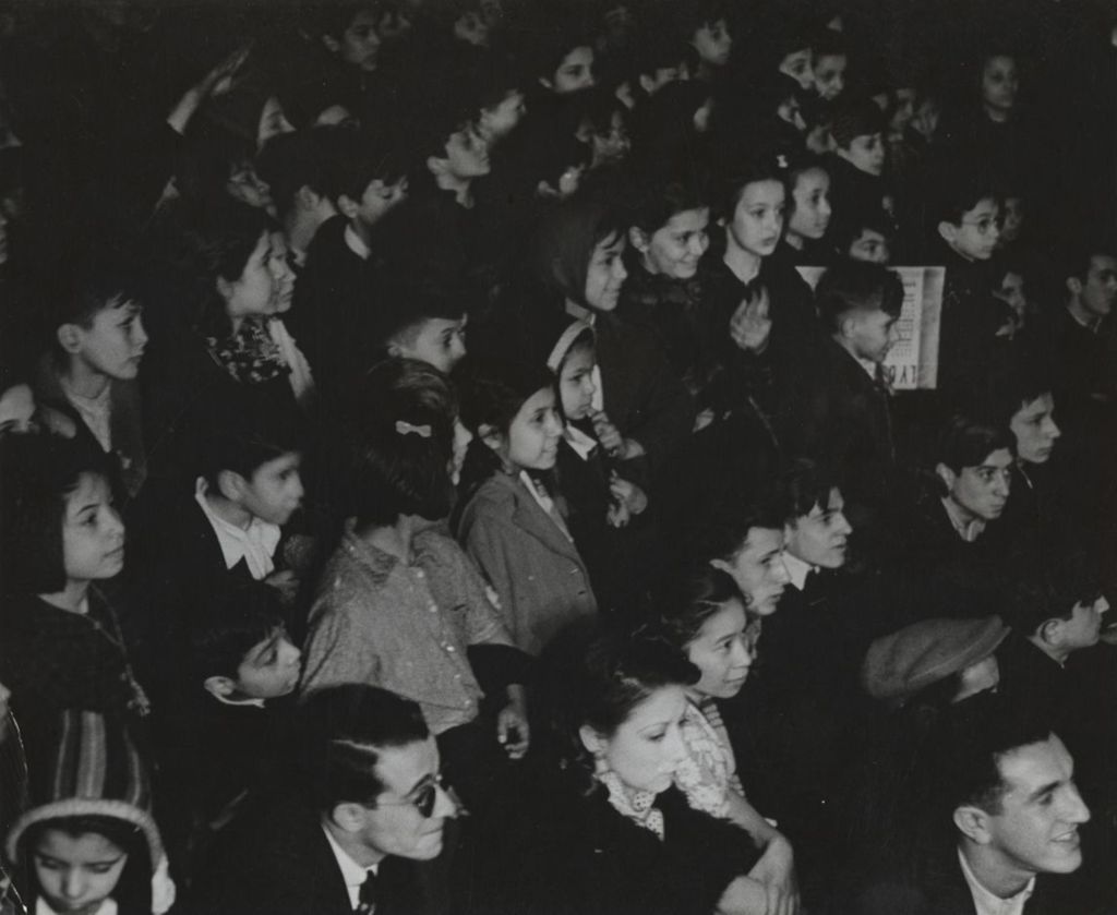 Audience of mostly children watching a 1940 Benny Goodman concert at Hull-House