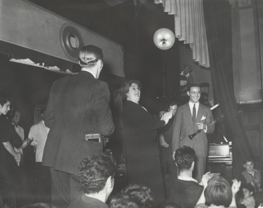 Miniature of Hull-House director Charlotte Carr with jazz clarinetist and bandleader Benny Goodman at a concert in Bowen Hall