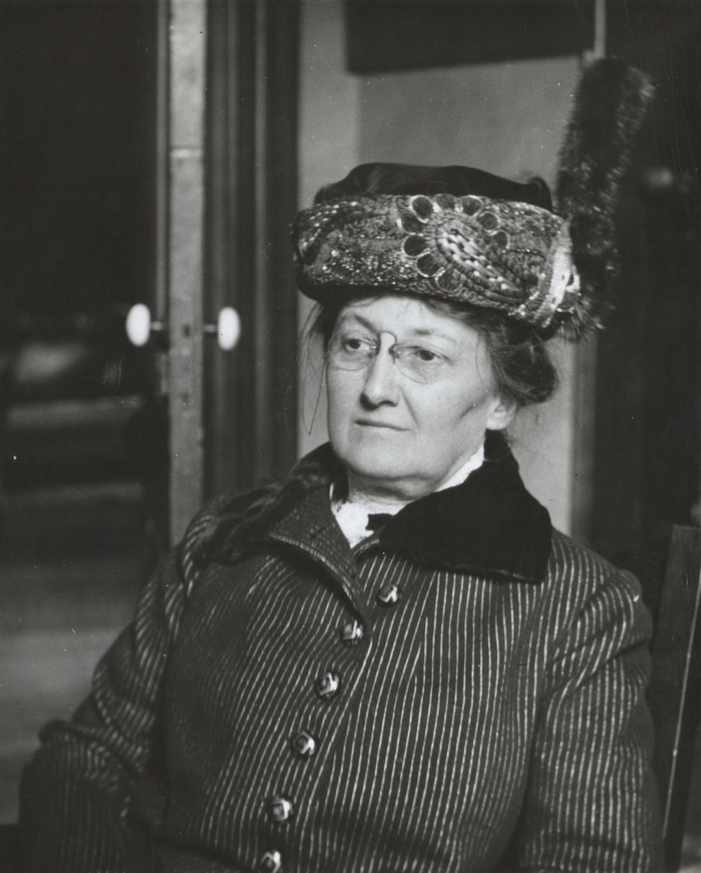 Hull-House Art School founder and director Enella Benedict in embroidered hat