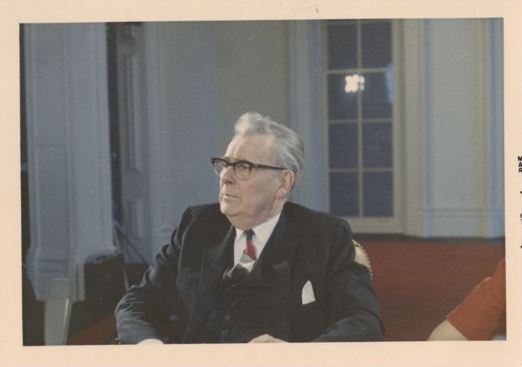 Miniature of Russell W. Ballard in a meeting in Hull Mansion