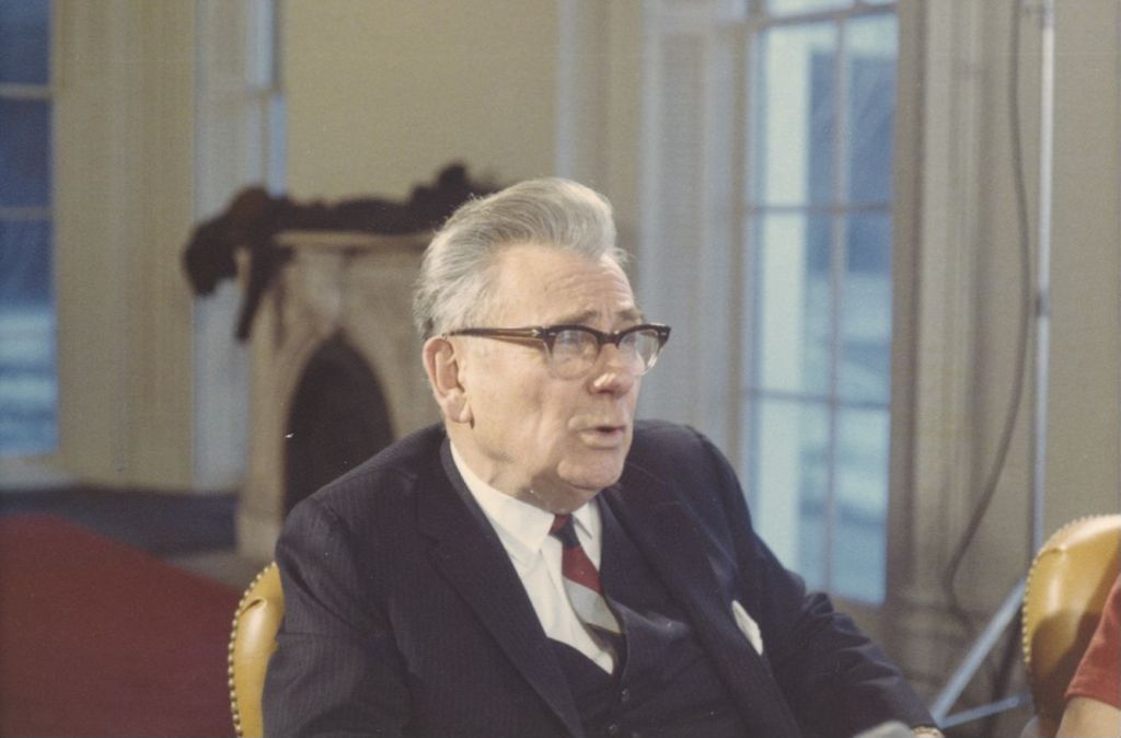 Russell W. Ballard in a meeting in Hull Mansion