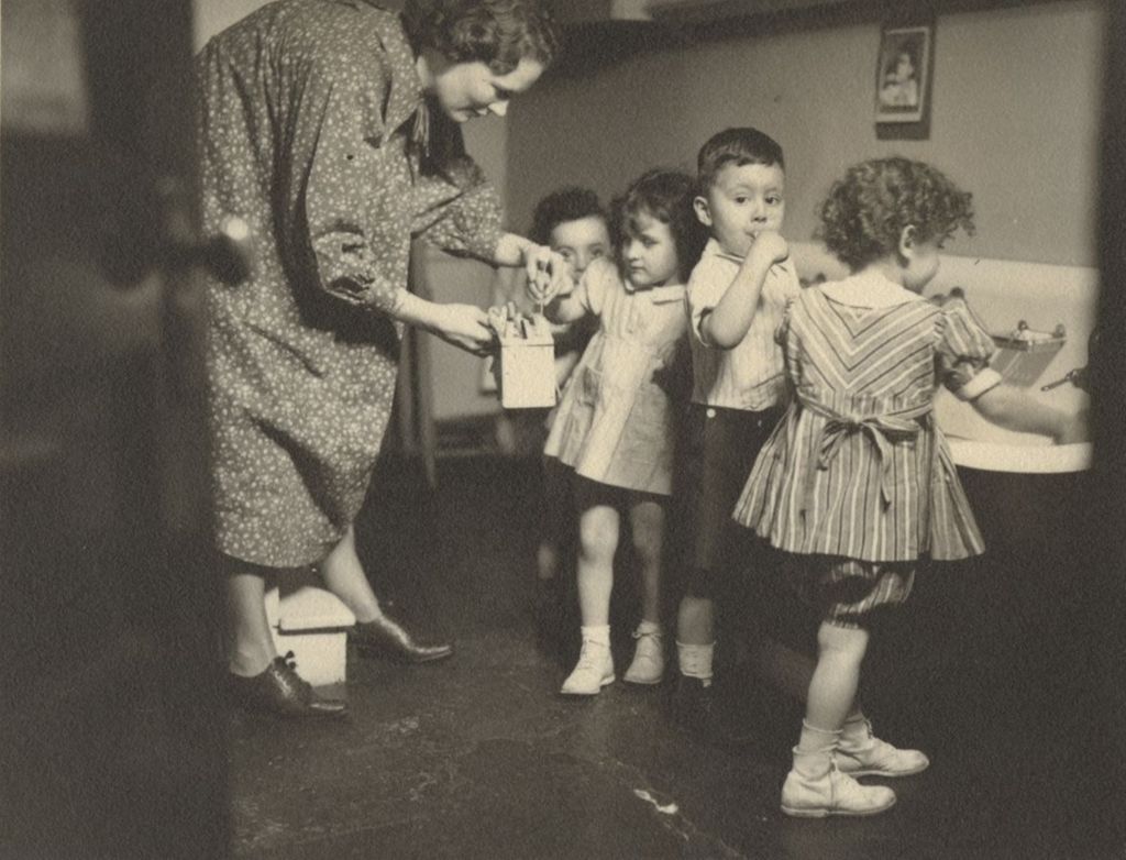 Children brushing their teeth at Mary Crane Nursery