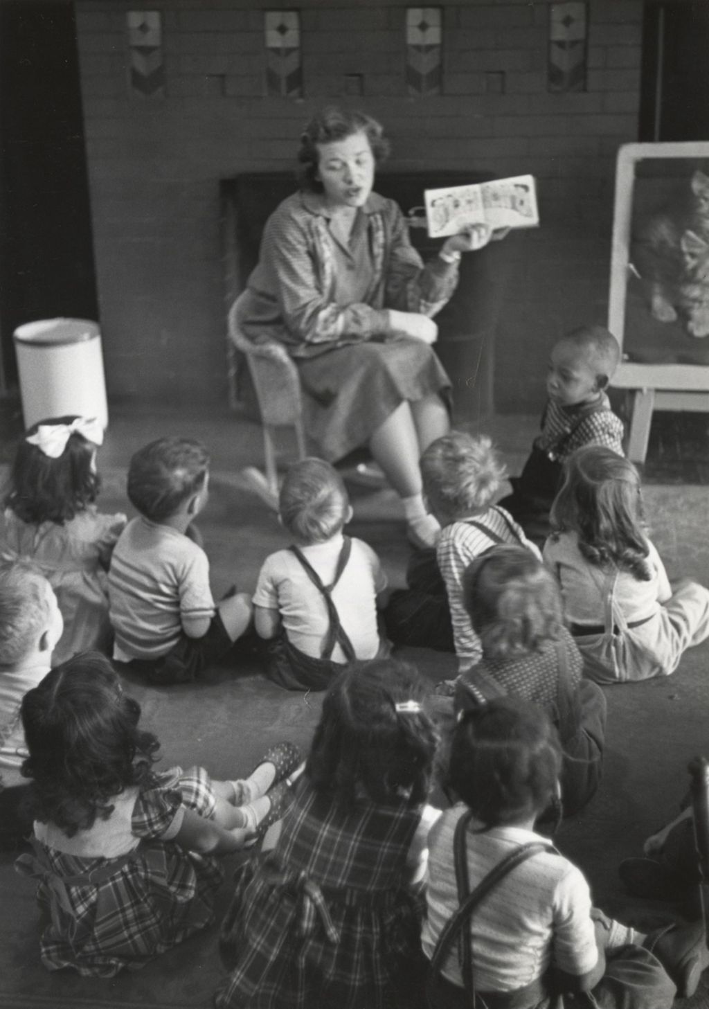 Miniature of Teacher reading picture book to students at Mary Crane Nursery