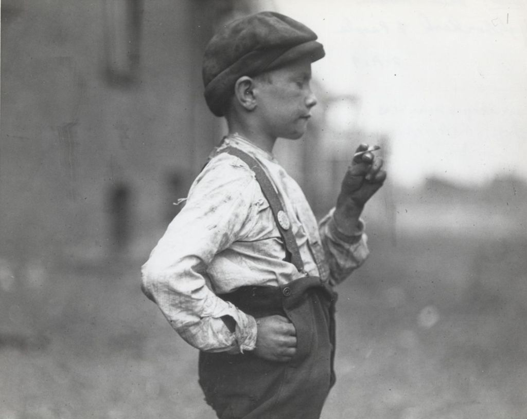 Boy holding cigarette during the 1904 Chicago Stockyard strike