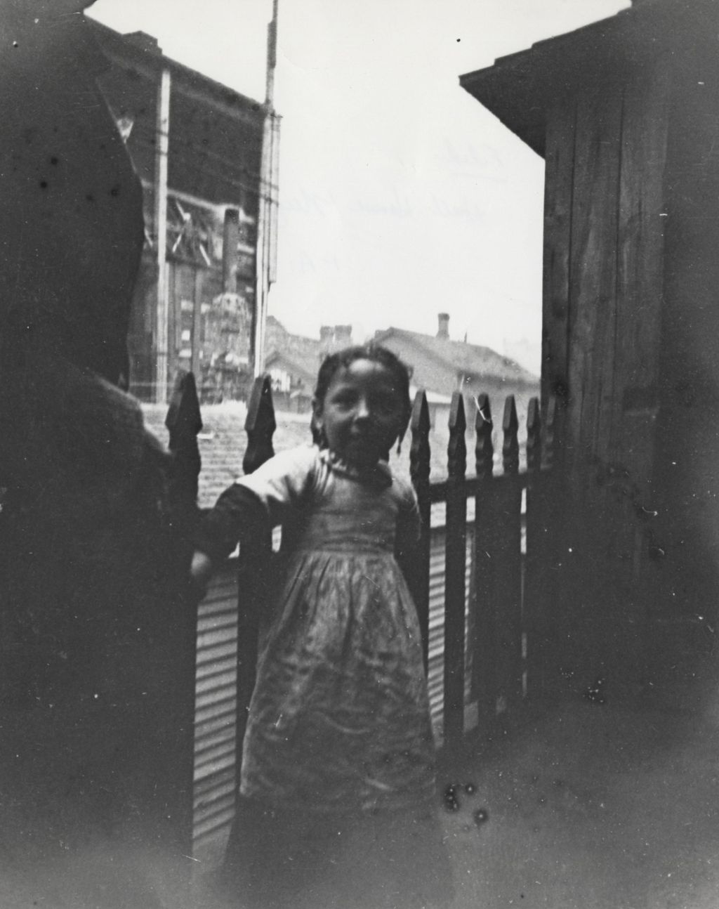 Miniature of Girl standing on a balcony in neighborhood near Hull-House