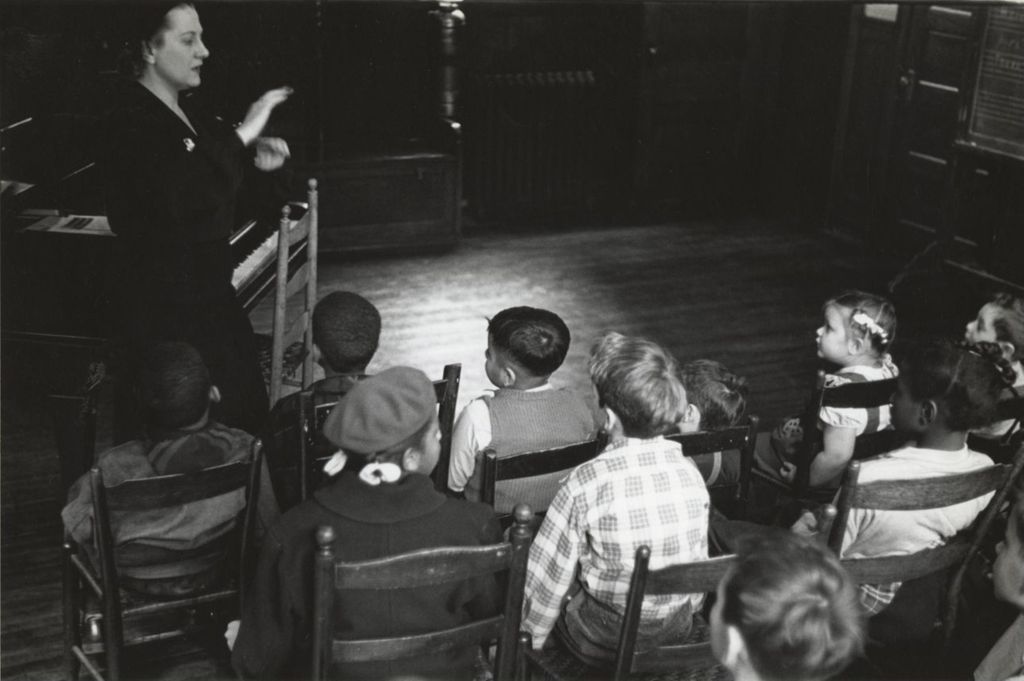 Miniature of Instructor leading a children's singing class