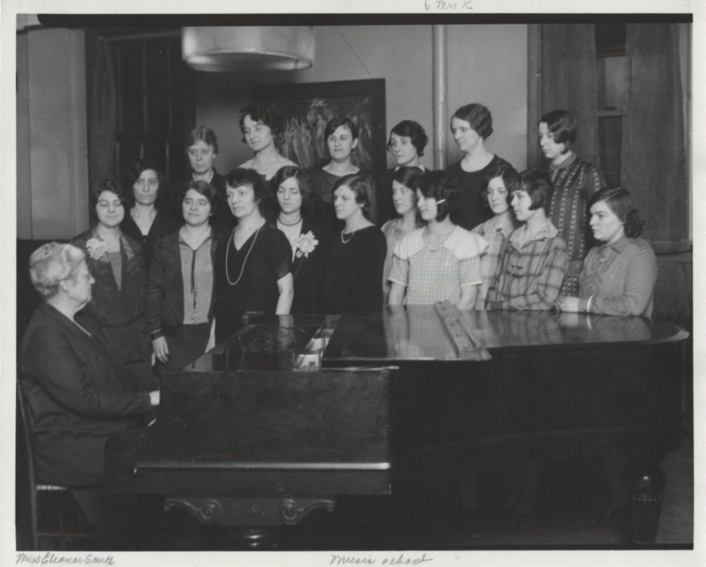 Women in singing class at Hull-House Music School with Eleanor Smith at piano