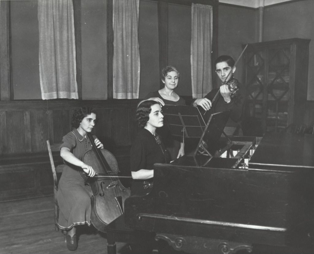 Miniature of Four members of the Adezio family performing at Hull-House Music School
