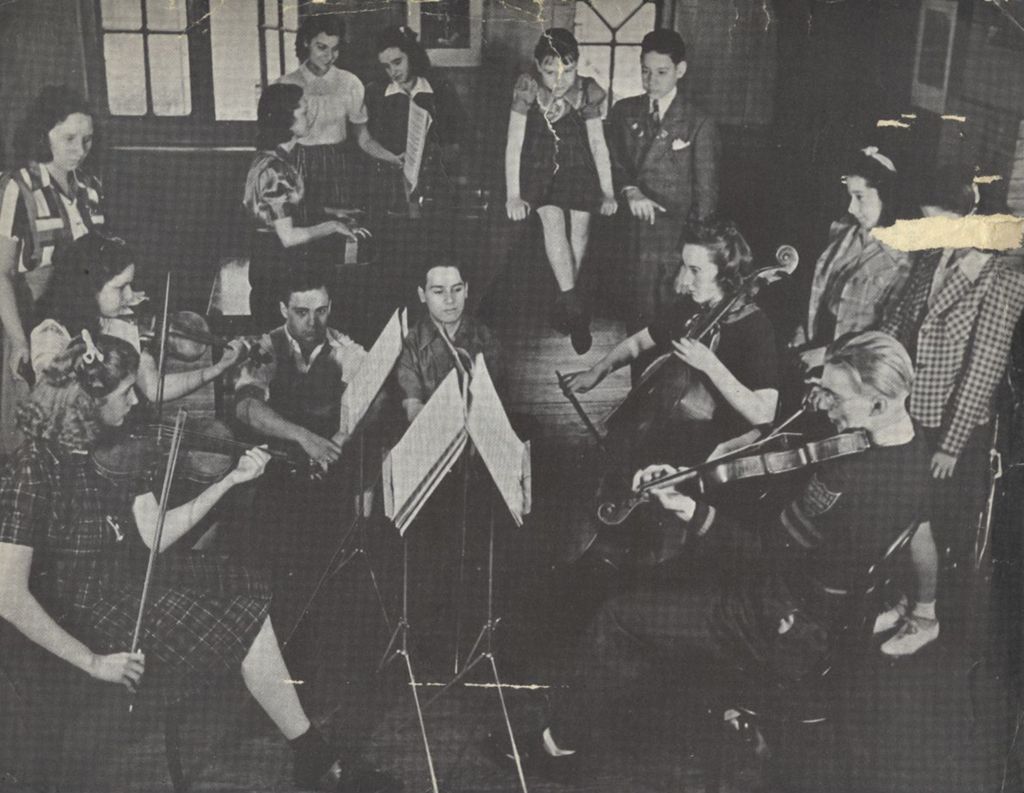 Miniature of Piano quintet playing at Hull-House Music School surrounded by young people