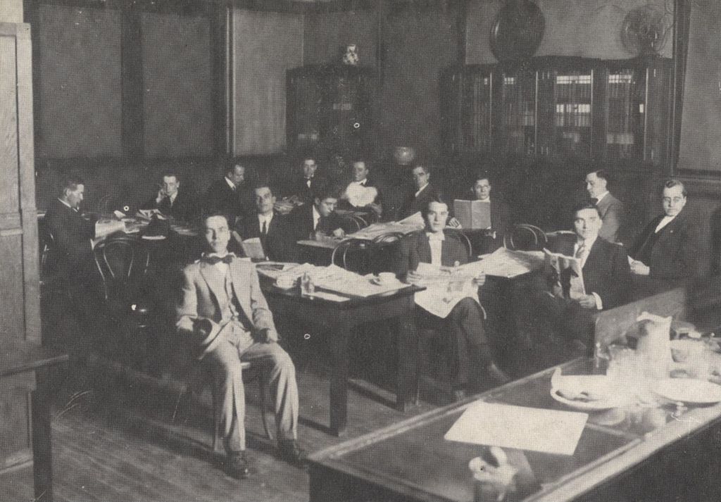 Men reading in the Hull-House Reading Room