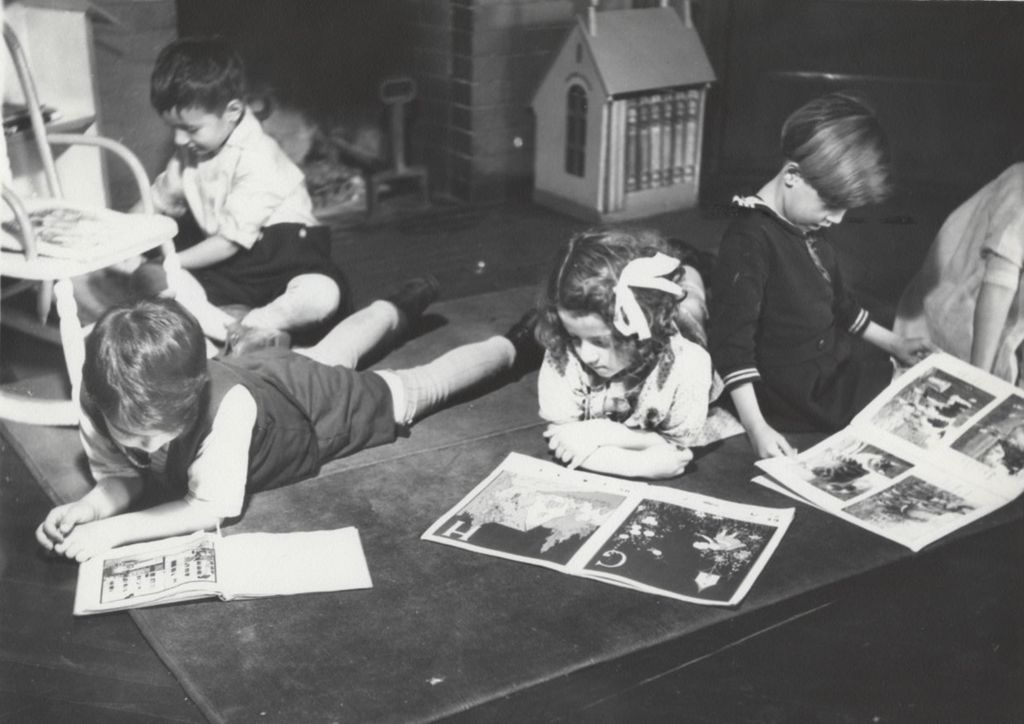 Children reading at Hull-House nursery school