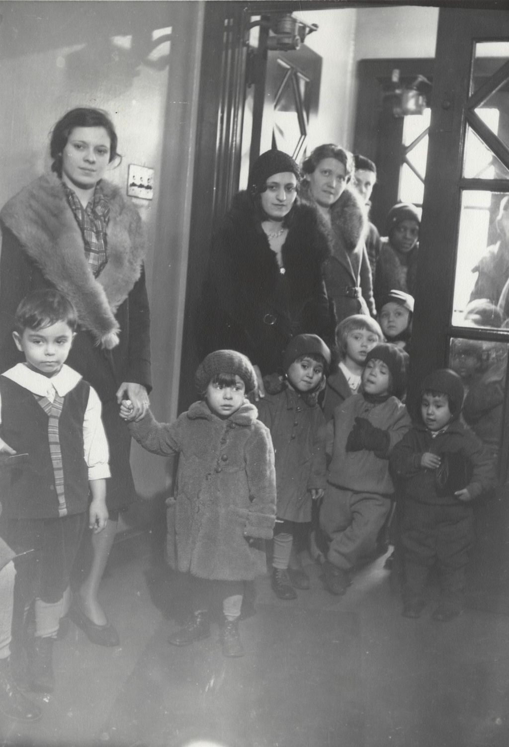 Mothers and children arriving at Hull-House nursery school