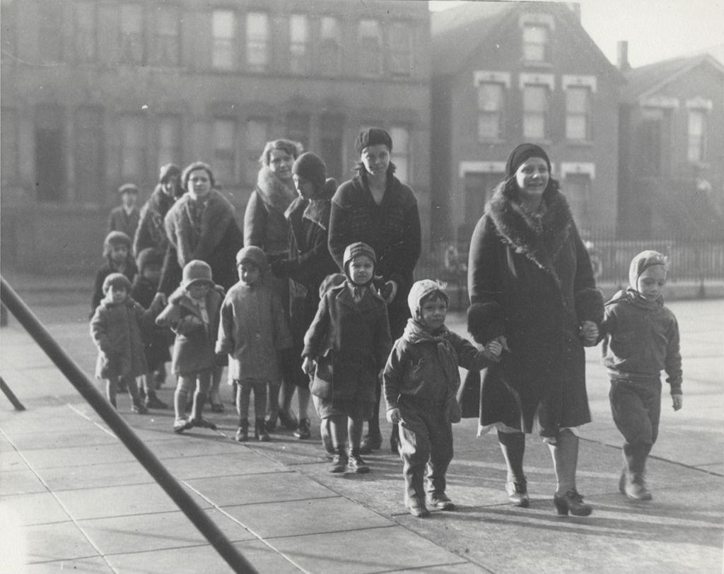 Mothers and children on way to Hull-House nursery school