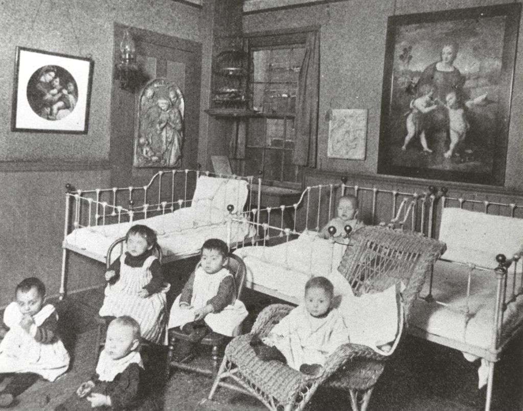 Miniature of Babies in chairs and cribs in the Hull-House creche