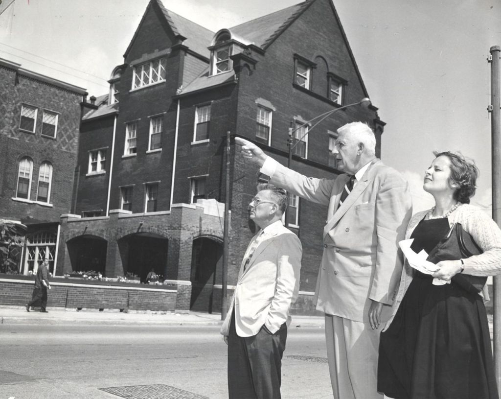 Russell Ballard shows Hull-House and its neighborhood to Senator Paul H. Douglas and Elsa McCormick