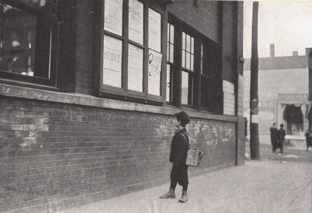 Miniature of Boy consulting the Hull-House Bulletin Board
