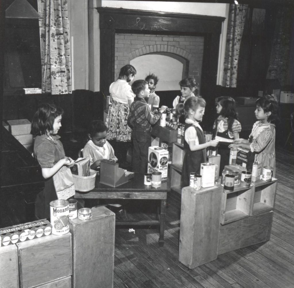 Children play-acting at a "store"