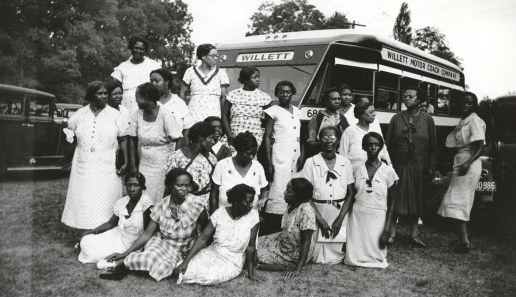 Hull-House Community Club members in front of a bus at Bowen Country Club