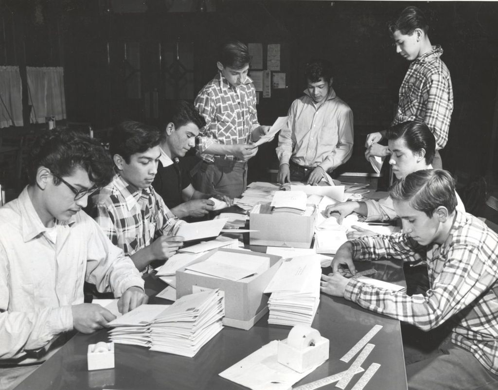 Young men mailing letters