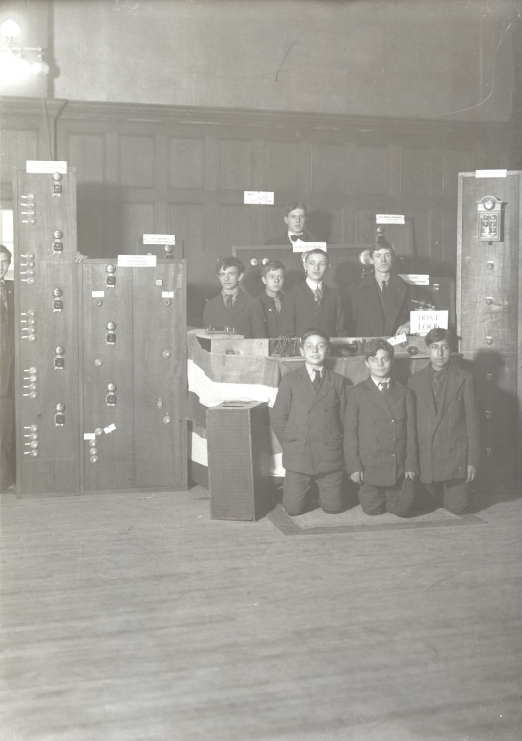 Miniature of Boys pose with display of doorbells in Frank Keyser club