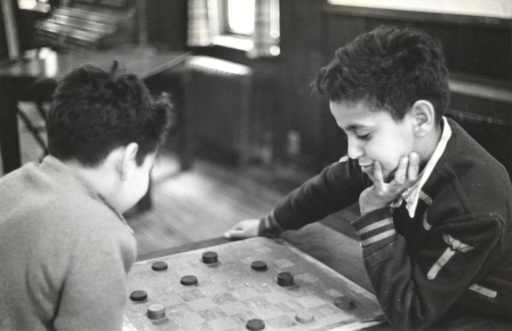 Miniature of Two boys playing checkers