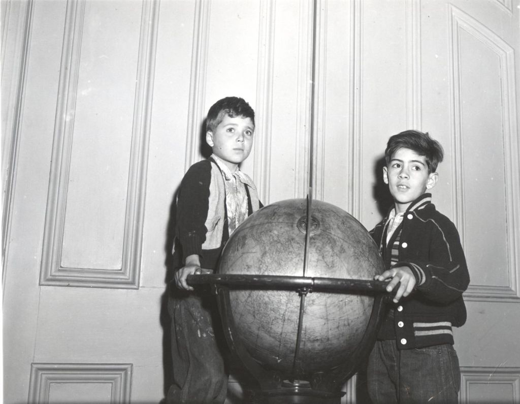 Miniature of Two boys with globe