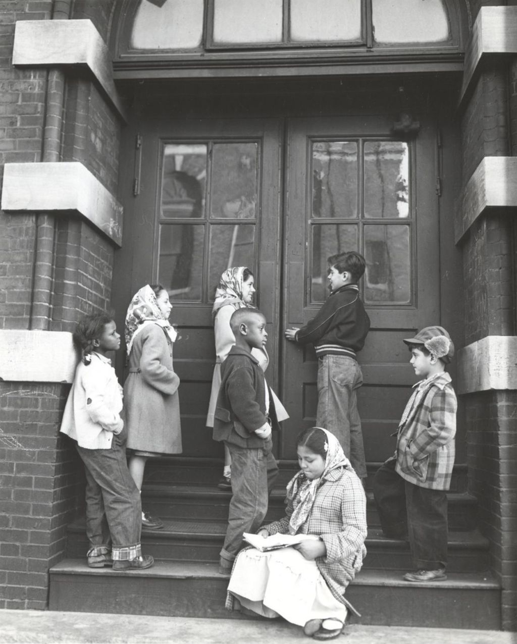 Miniature of Group of children in doorway of Hull-House coffee house and theater building