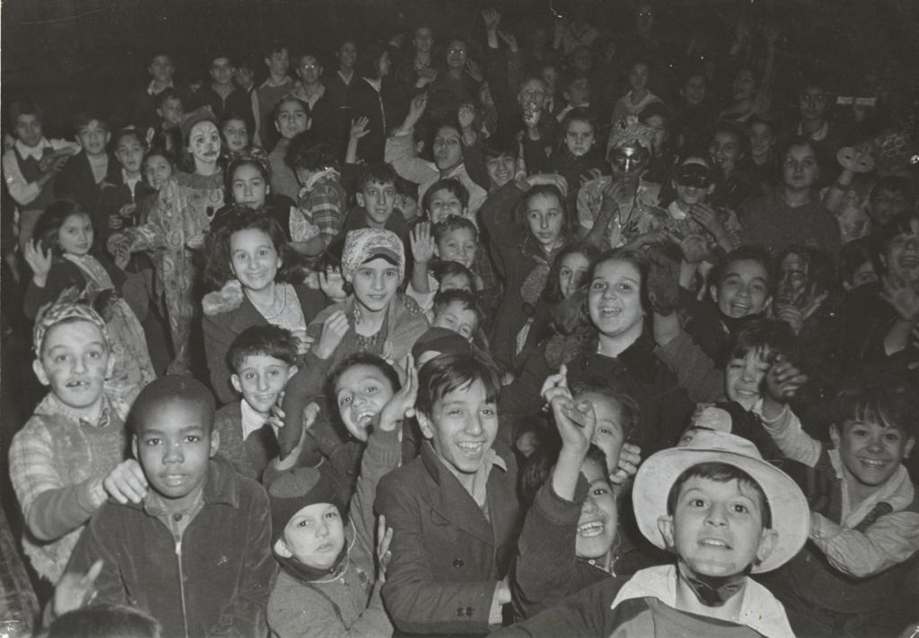 Large group of children at 1949 Hull-House Halloween party