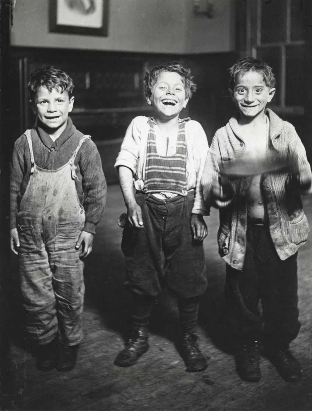 Miniature of Three boys standing inside Hull-House