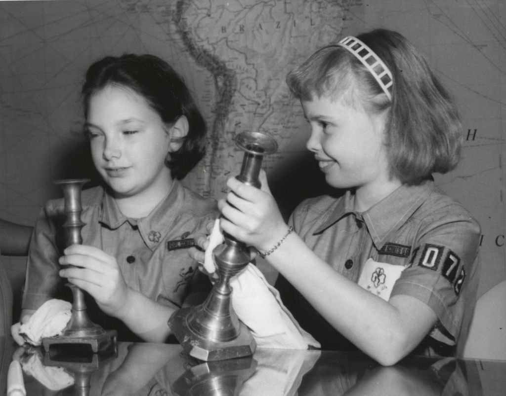 Miniature of Two girl scouts polishing candlesticks