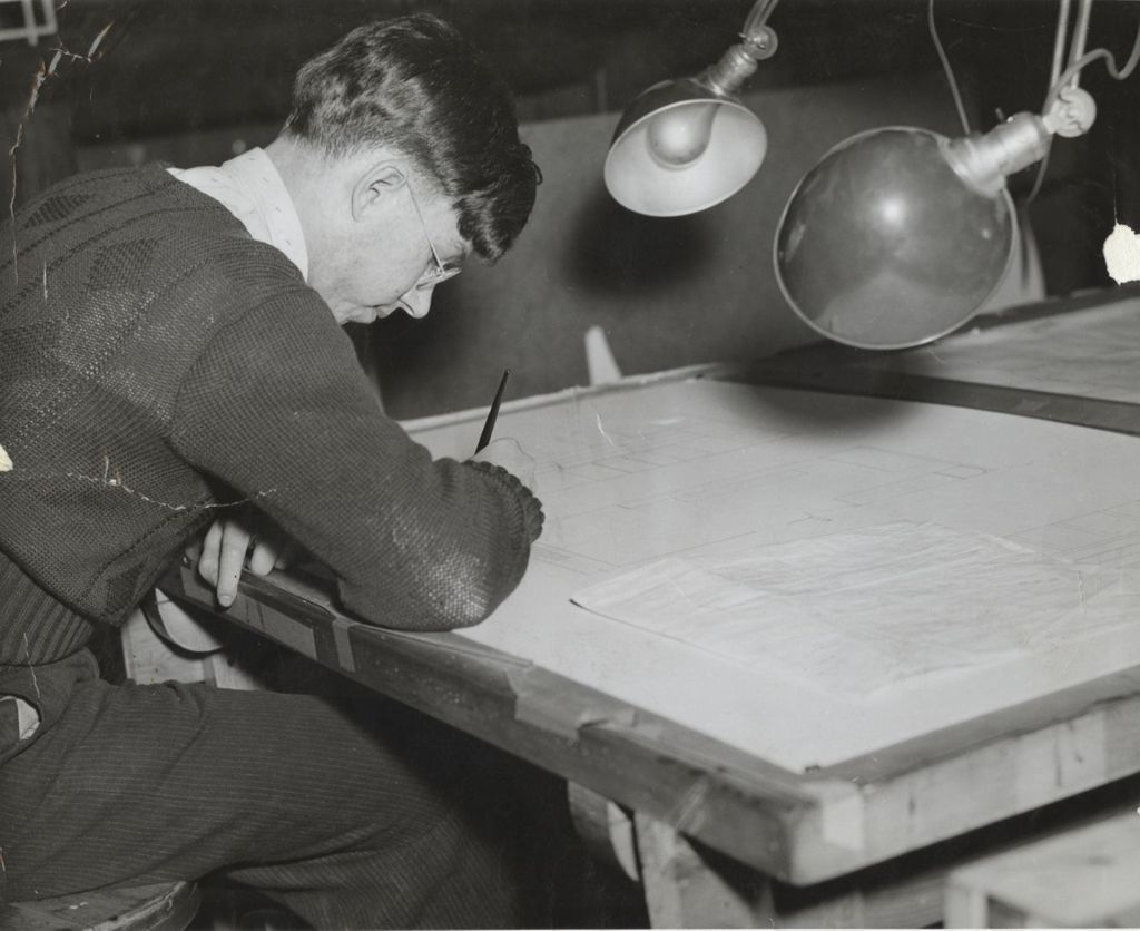 Young man at drafting table