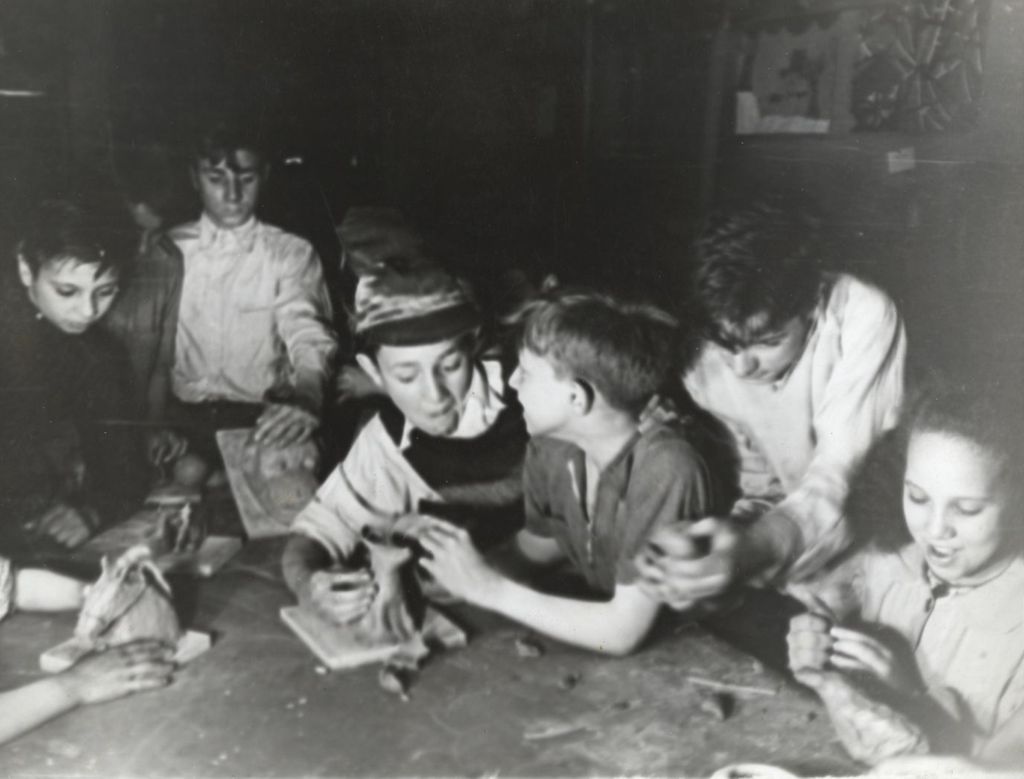 Miniature of Children in ceramics class