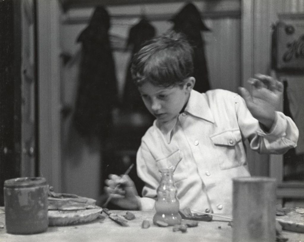 Miniature of Boy painting ceramic piece