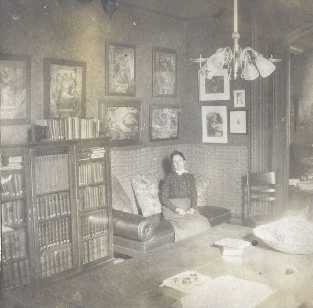 Miniature of Woman sitting in Hull-House Apartment