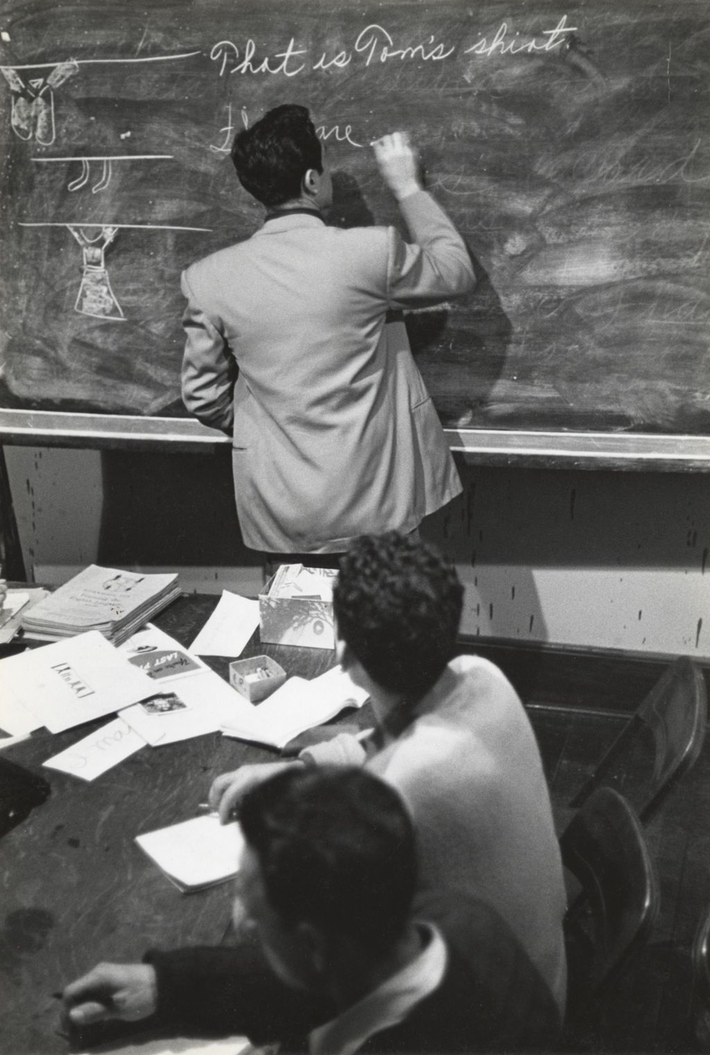 Miniature of Instructor at the blackboard with students during Adult Education class
