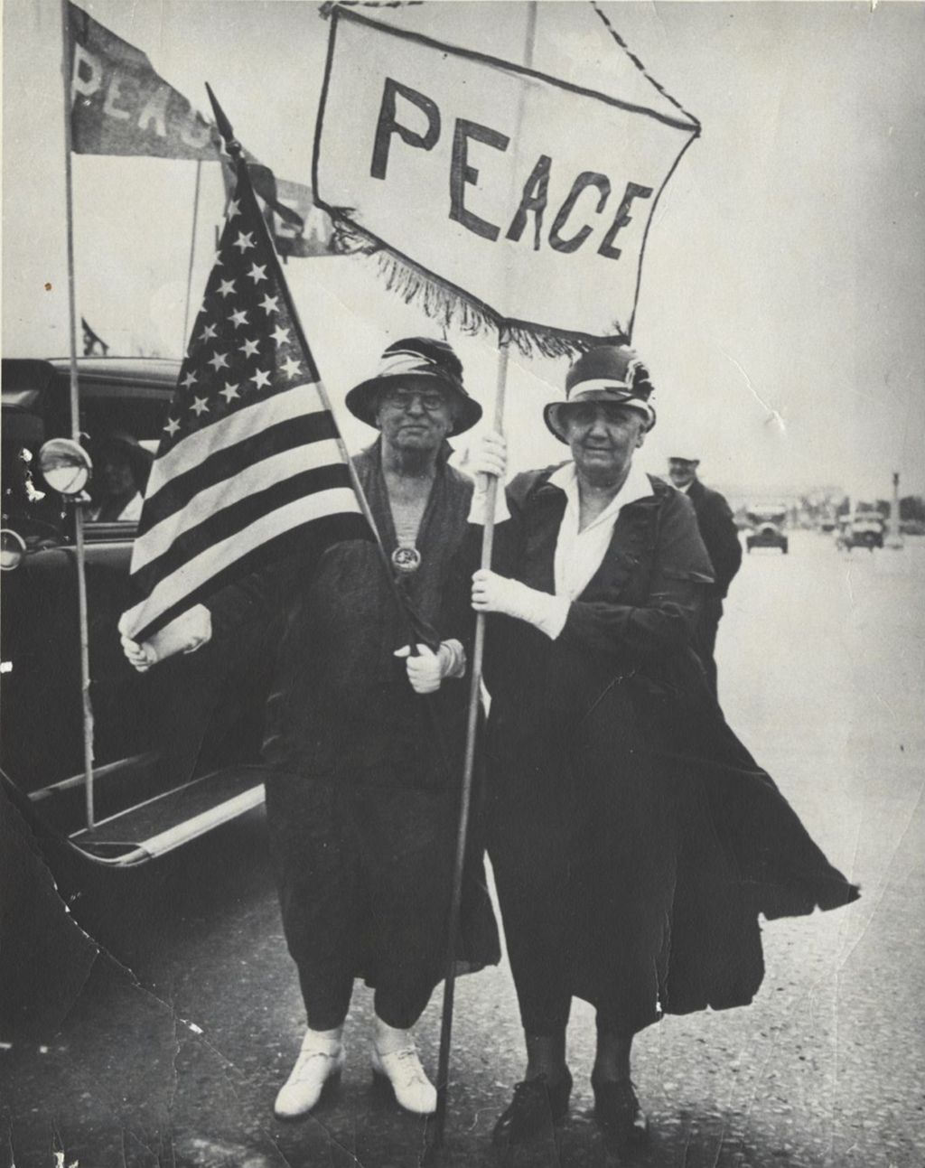 Miniature of Jane Addams and Mary McDowell with peace banner