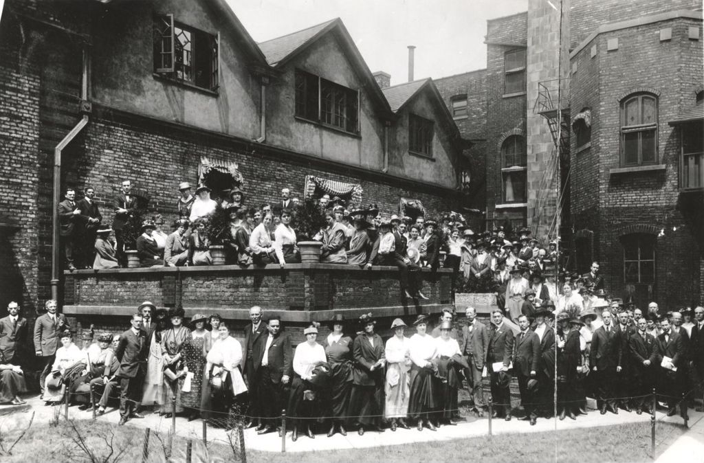 Huge crowd of settlement house workers attending a settlement house conference gathered on the Resident's Dining Hall porch and courtyard