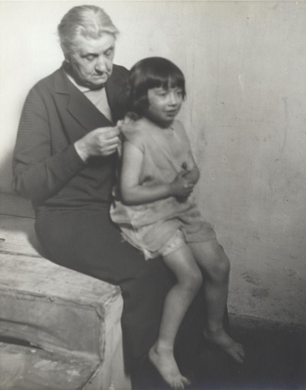 Jane Addams with Theater Child Seated on Her Lap